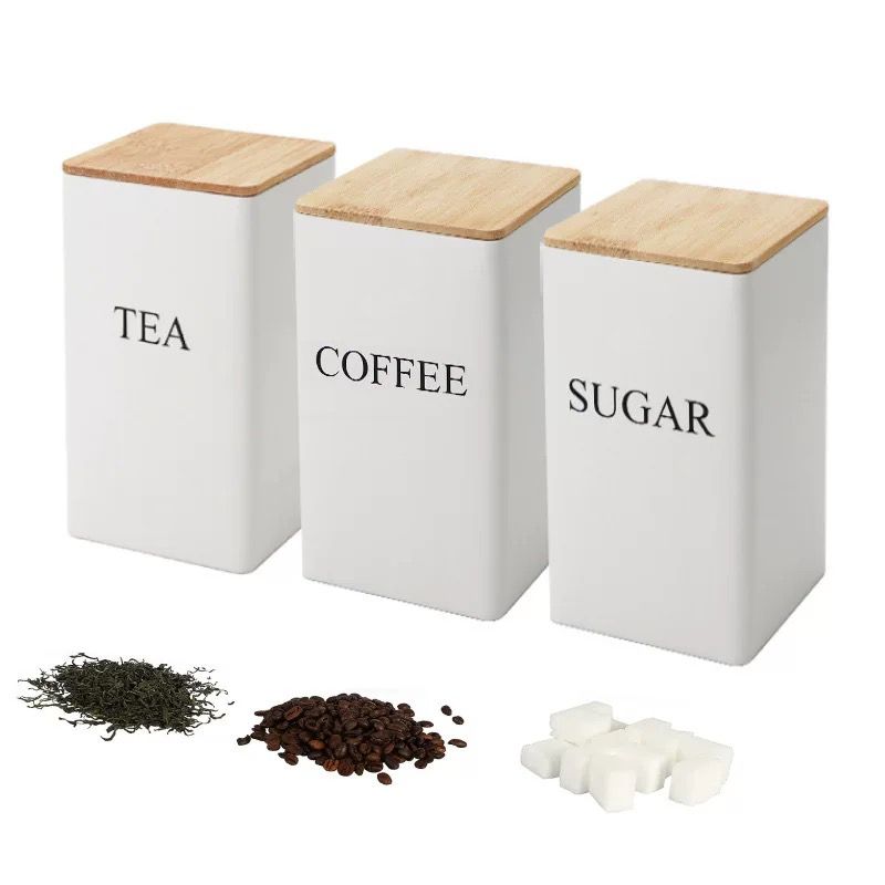 3-piece kitchen storage canister set black & white design with bamboo lids for coffee, sugar, and tea.