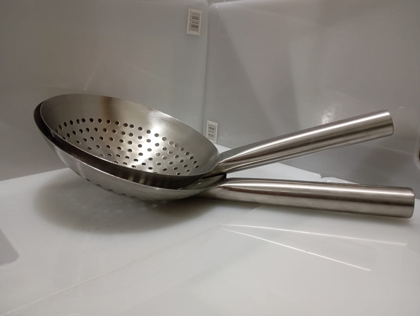 Stainless Steel skimmer strainers colander spoons, used for straining and frying various foods.