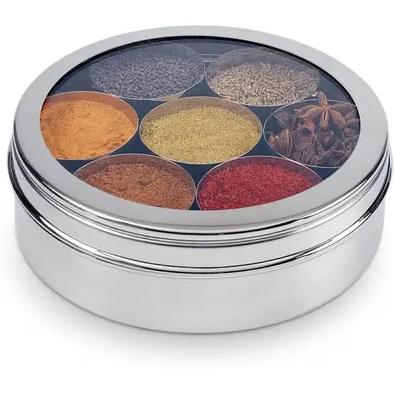 Round steel spice box with clear lid open showing small spice bowls