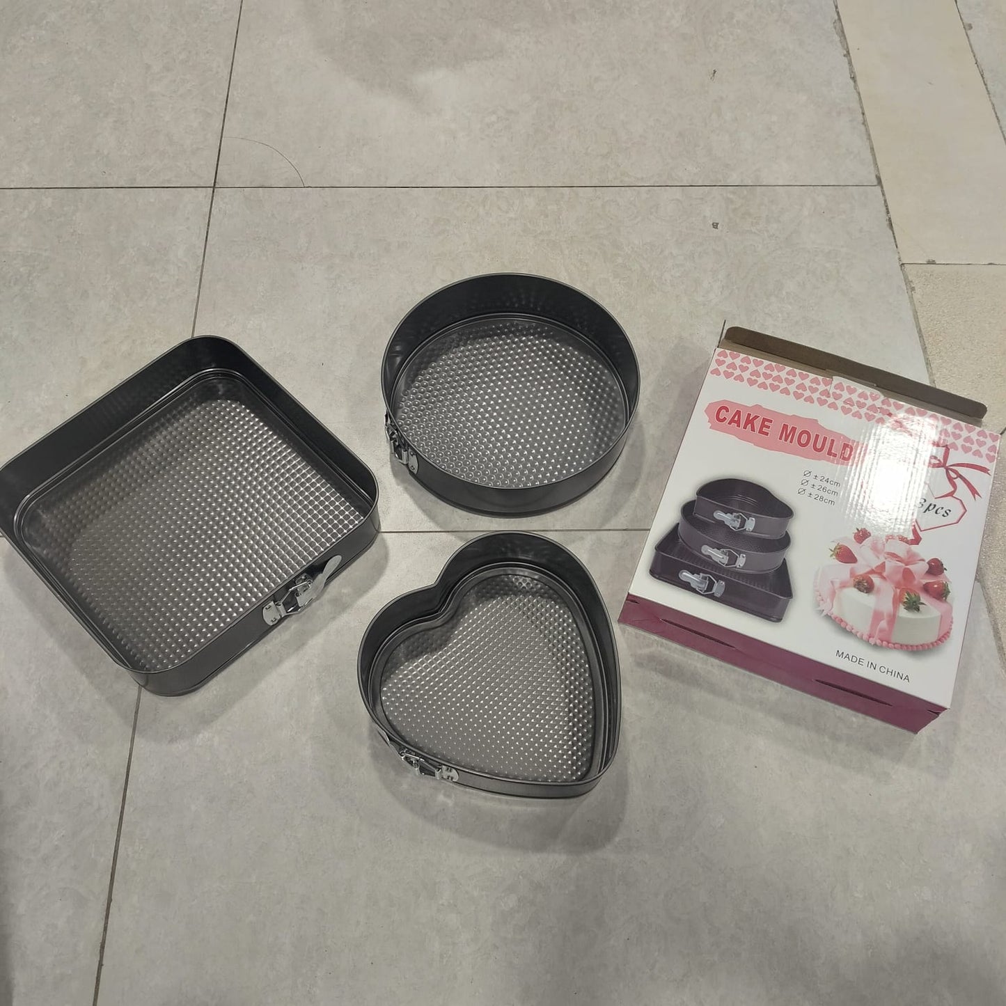 3-piece non-stick springform cake pan set  heart ,round, and square shapes.