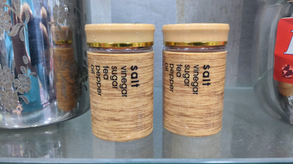 canister set features a bamboo-effect plastic coating and a gold lid. 2pcs set