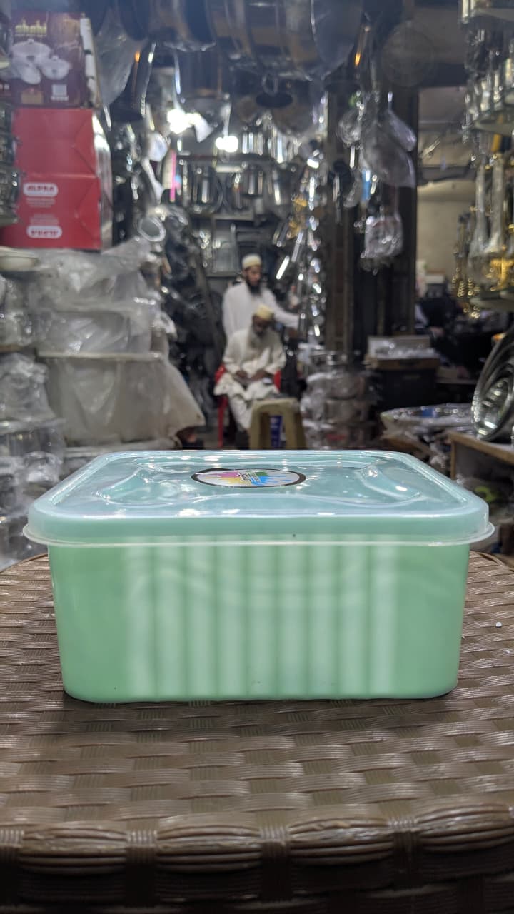 This mint green, stackable plastic container 2 box set