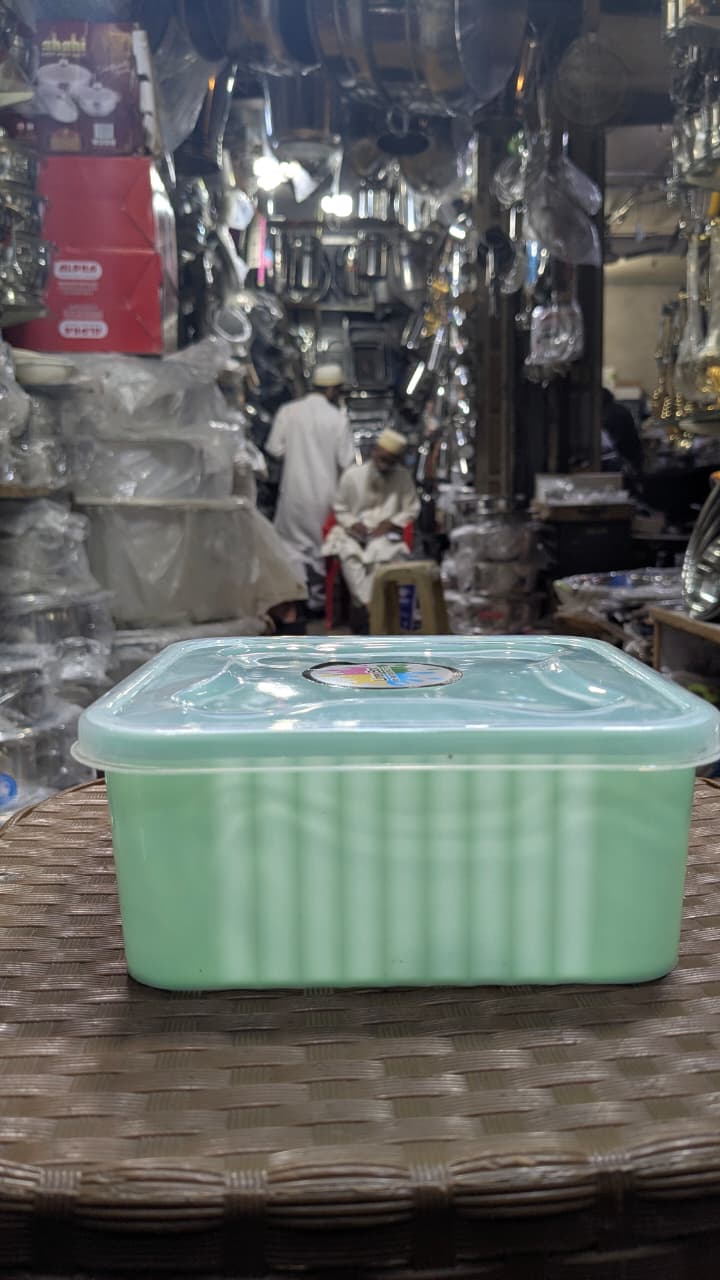 This mint green, stackable plastic container 2 box set