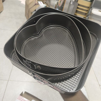 3-piece non-stick springform cake pan set  heart ,round, and square shapes.