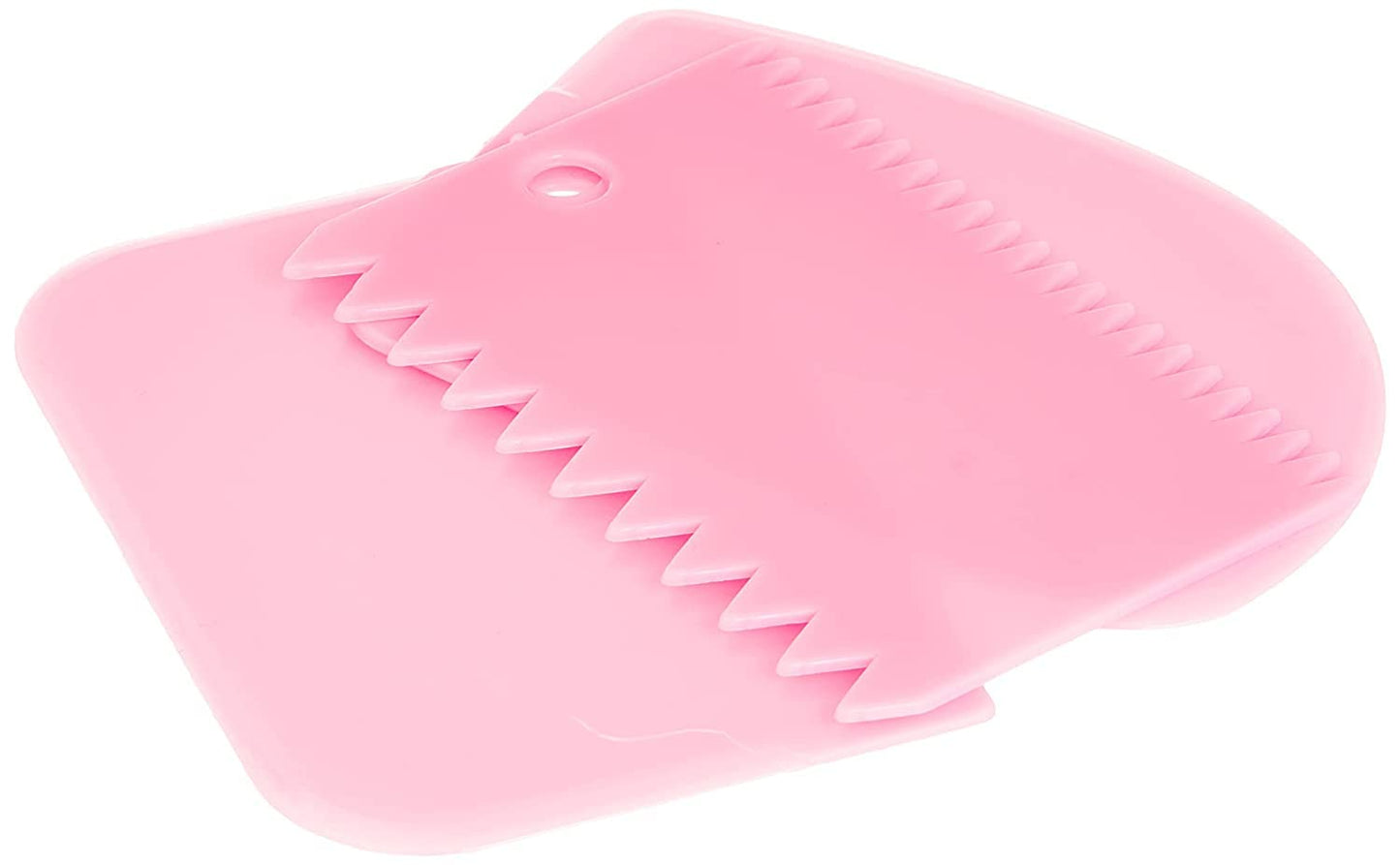 pink plastic cake decorating scrapers used for smoothing icing, cutting fondant, or dividing dough.