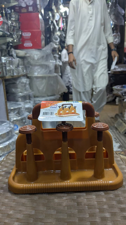 This brown plastic rack is a Unique Glass Stand designed to hold six glasses or cups.