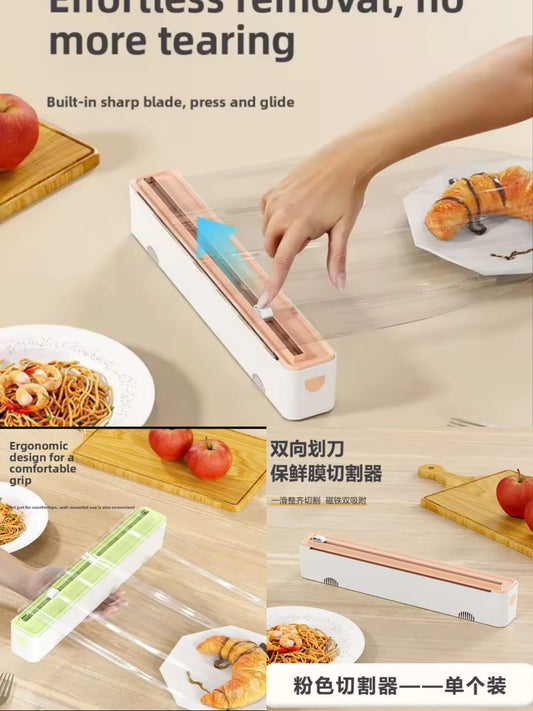 plastic wrap dispenser featuring a sliding cutter