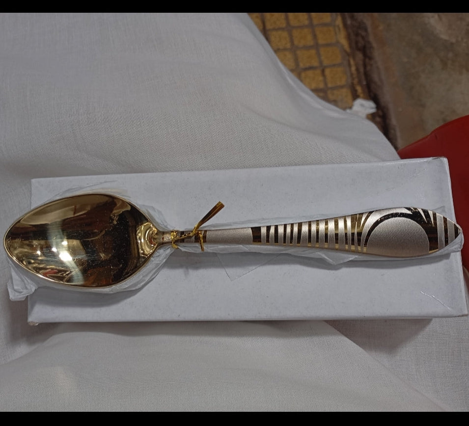 golden spoo with laser design